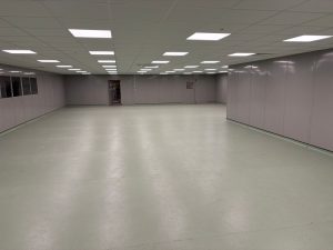 Main clean room chamber with double skin steel partitioning, suspended ceiling and safety vinyl flooring