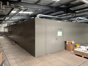 Double skin steel partitioning enclosure installed inside Molymer Moulding Services Ltd industrial facility